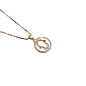 Detail of gold Fatima hand pendant with colorful gemstones and sparkling zircon stones