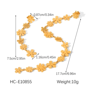 Detailed view of 18K gold daisy long drop earrings with size measurements in cm and inches