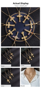 Detail view of cross necklaces with colorful zircon stones in gold plated titanium steel