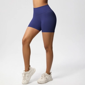 Detail view of high waist navy blue gym shorts with seamless texture and butt lift effect