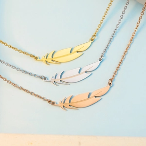 Three-color feather pendant necklaces in gold, silver, and rose gold stainless steel