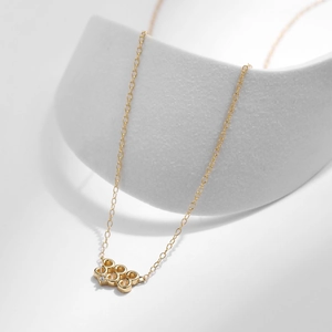 Elegant 925 sterling silver gold-plated necklace featuring 333 lucky number rings