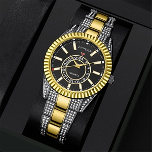 Close-up of a two-tone steel watch with rhinestones in a luxury black gift box