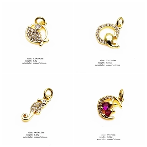 Detail of gold fish dolphin seahorse and moon charms with zircon inlays and dimensions