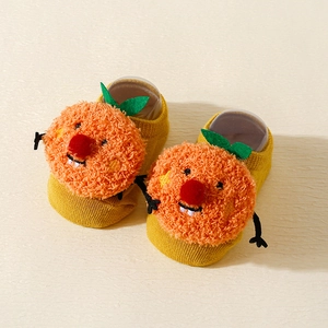 Cozy pumpkin-orange baby floor socks with cute 3D orange plush for toddlers