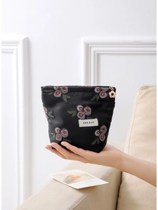 Floral jacquard cosmetic bag with rose embroidery and gold flower zipper charm