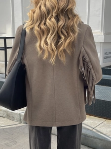 Elegant khaki long-sleeve jacket with stylish tassel details on the back and shoulders