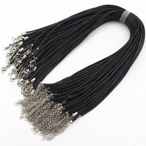Close-up of black wax cord necklaces with silver lobster clasps and extension chains