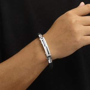 Men's fashion braided leather bracelet with diamond-encrusted steel centerpiece charm