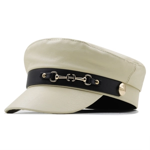 Beige faux leather sailor cap with black strap and golden horsebit metal buckle