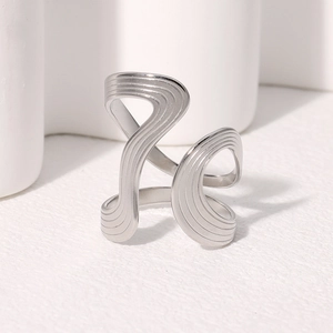 Minimalist silver wavy geometric ring with vintage abstract textured lines
