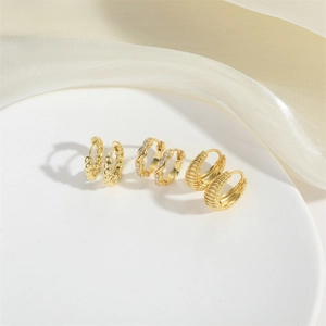 Three-piece gold hoop earring set with twisted rope, pavé zircon, and chunky ribbed designs