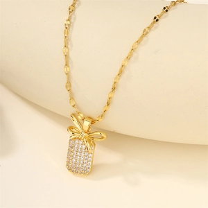 Pave-set crystal bow gift tag pendant necklace in gold titanium steel for women