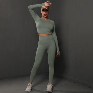 Detail of sage green seamless yoga set with thumb holes and high waist leggings