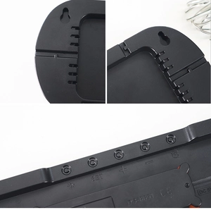 Detailed view of LED wall clock back panel with functional buttons and DS-3651 model info