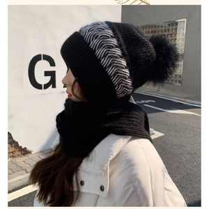 Winter knitted hat and scarf set with wave pattern and pompom for women in black