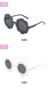 Side view of C6 and C7 flower-shaped kids sunglasses in ivory and dark green