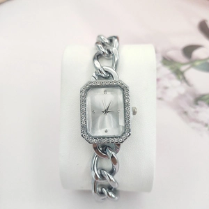 Elegant silver chain style women's watch with rhinestone bezel and rectangular dial