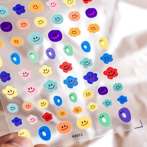 Colorful cloud emoji nail art stickers with smile faces on a transparent sheet KX072