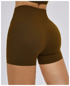 Detail view of high-waist ribbed yoga shorts with V-shaped back stitching for butt lifting