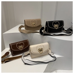 Collection of heart-stitched crossbody saddle bags in four colors with wide straps