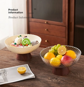 Detail of pedestal fruit bowls with diamond textures and walnut wooden bases