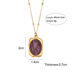 Gold chain necklace with oval purple natural stone pendant in retro style display