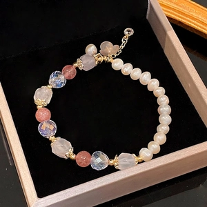 Elegant freshwater pearl and strawberry crystal heart bracelet with gold accents
