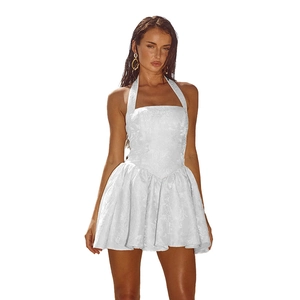 Detailed view of white jacquard fabric on elegant halter neck slim fit mini dress