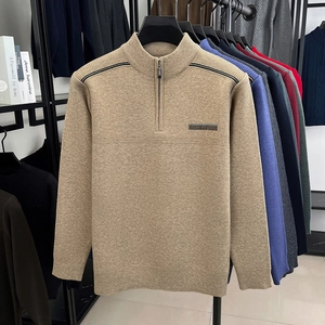 Detail of men's quarter-zip knit sweaters in khaki and various colors with shoulder stripes