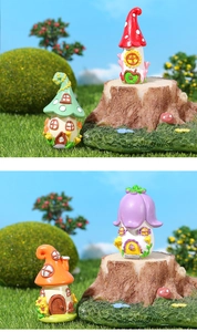 Macro detail of colorful miniature resin mushroom houses for miniature garden landscaping