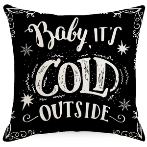 Black Christmas pillow case with Baby It's Cold Outside text and white snowflakes