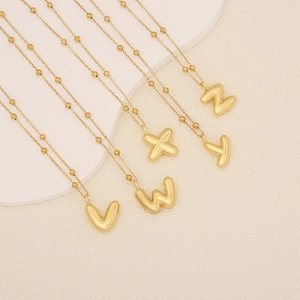 Golden bubble letter pendants V to Z on a beaded chain minimalist jewelry set