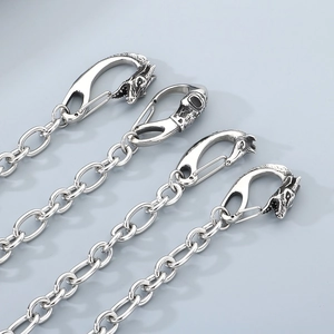 Gothic punk wallet chains featuring skull and wolf head charms in vintage silver finish