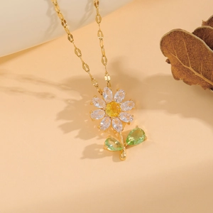 Elegant gold daisy pendant necklace with sparkling clear, yellow and green gemstones