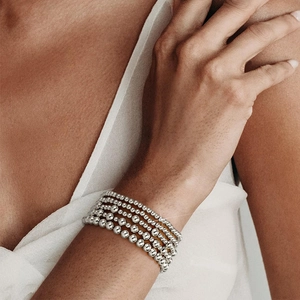 Multi-layer silver hematite beaded bracelet set for women worn on wrist with 14k metallic finish