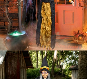 Detailed view of Halloween hanging witch with glowing red eyes and tattered robes