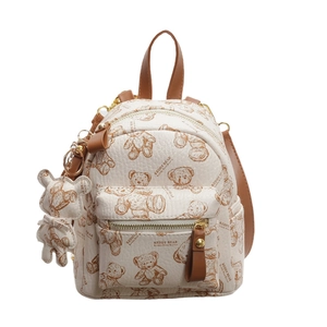 Mini sac à dos crème avec imprimé ours brun et lanières en cuir vu de face de l'avant