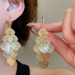 Three-tone hollow geometric leaf tassel earrings with gold silver and rose gold finish