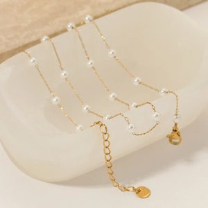 Elegant French baroque style pearl necklace with gold chain and lobster clasp