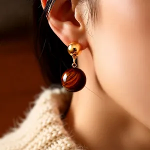 18k gold plated tiger eye drop earrings with a vintage minimalist spherical design
