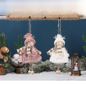 Detail of plush Christmas angel ornaments with sequined antlers and wooden beads