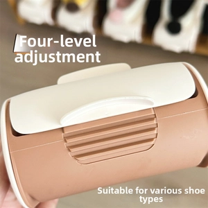 Detail of adjustable double-layer plastic shoe rack with four-speed height gears