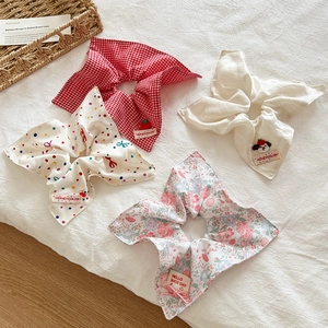 Floral and polka dot scrunchie set with gingham and cream designs in a rustic style