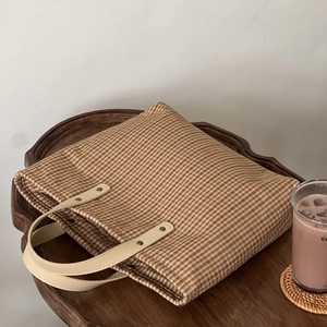 Vintage plaid canvas tote bag in brown and yellow with faux leather handles for daily use