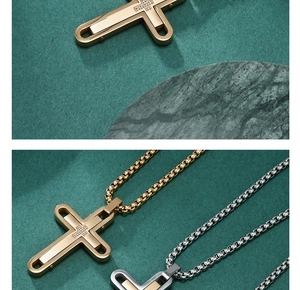 Macro detail of gold and silver rhinestone cross necklaces with layered metal texture