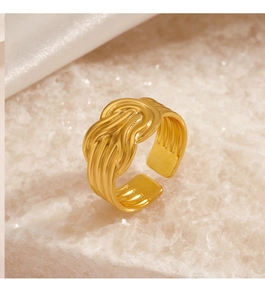 Detail of 18K gold plated adjustable ring with layered wave texture on stone and silk