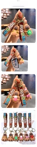 Close-up of cute cartoon Capybara keychains with various outfits and durable silicone finish