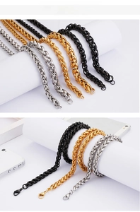 Detailed view of 8mm titanium steel wheat chain in gold, silver, and black finishes