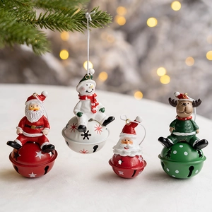 Set of resin and metal Christmas bells featuring Santa Claus, Snowman, and Reindeer figures